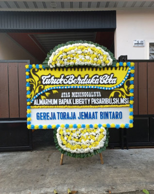 Papan Bunga Duka di Belian